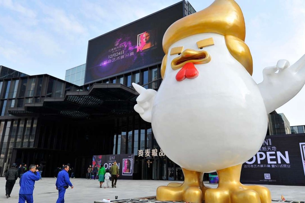 A giant rooster sculpture – said to resemble US President-elect Donald Trump – at a shopping mall in Taiyuan, north China's Shanxi province. Photo: AFP