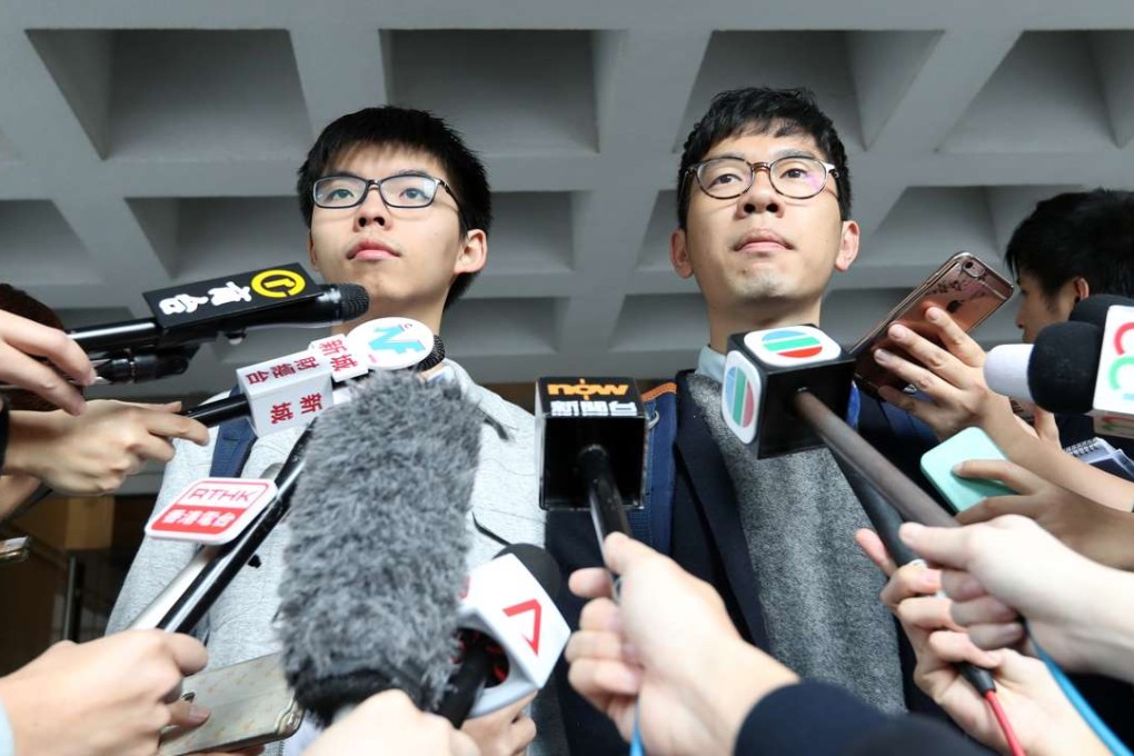 Joshua Wong Chi-fung (left) and Nathan Law Kwun-chung were present for the Thursday hearing. Photo: Nora Tam