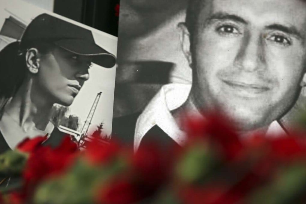 Photos of victims and floral tributes are left at the scene of the New Year’s Day terrorist attack at a nightclub in Istanbul. Islamic State has claimed responsibility for the attack that killed 39 people. Photo: AP