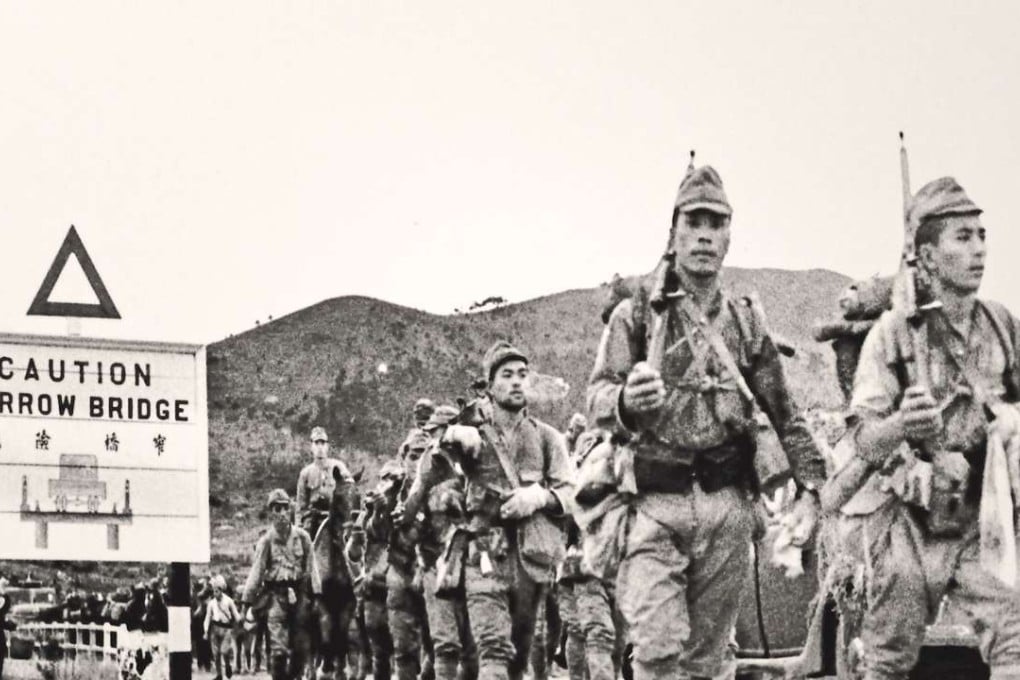 Japanese troops march across the border into Hong Kong. Photo: Alamy Stock Photo