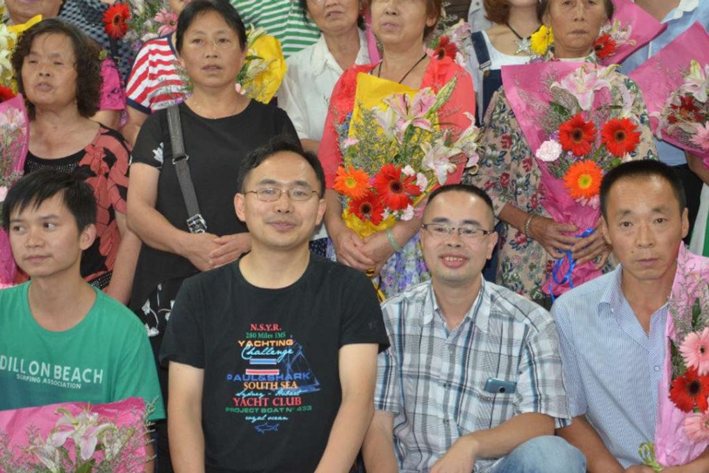 Pastor Su Tianfu, in black T-shirt, and Pastor Yang Hua, in checked shirt. Photo: Handout