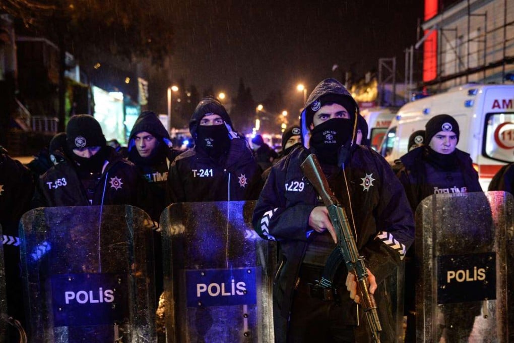 Turkish police officers block the road leading to the scene of an attack in Istanbul. Photo: AP