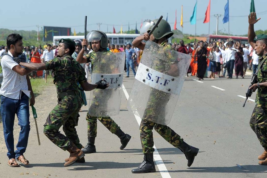 Sri Lankan activists clash with police at a protest against Chinese investments in a port on the island. Photo: AFP
