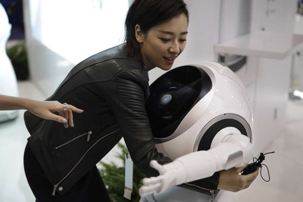 A robot hugging someone at the event in Las Vegas. Photo: AP