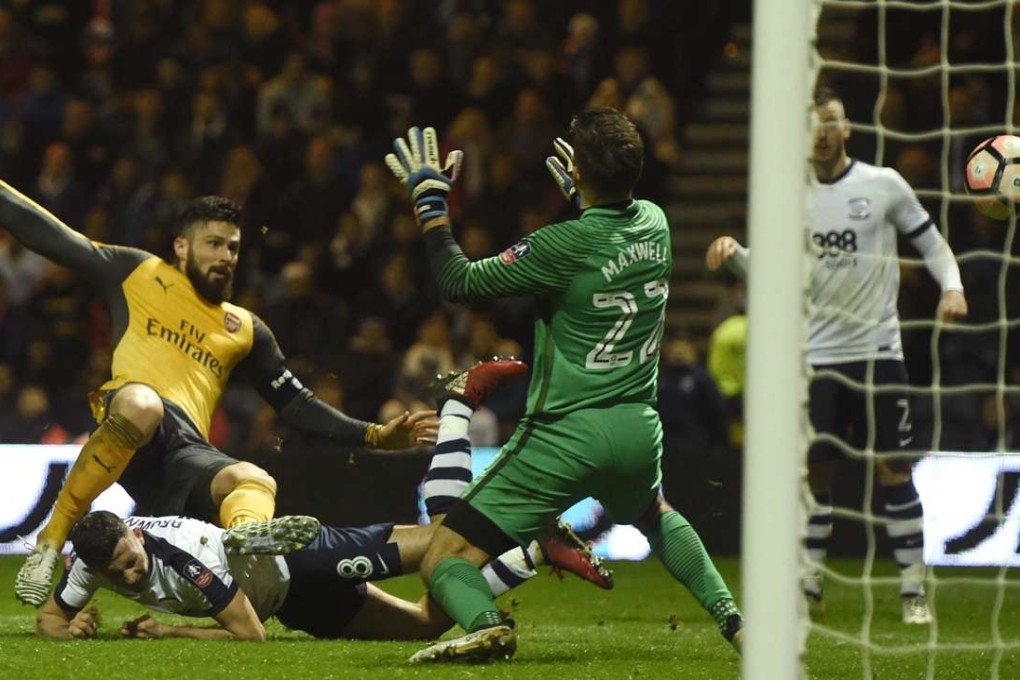 Arsenal's Olivier Giroud scores the winner against Preston North End. Photo: Reuters