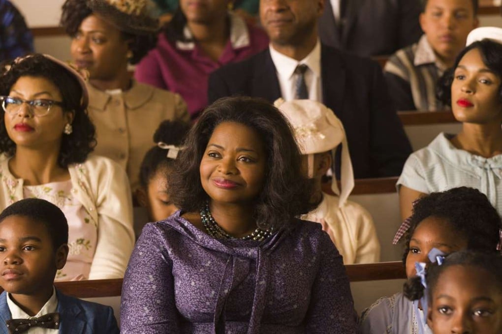 Taraji Henson (back, left), Octavia Spencer (centre) and Janelle Monae (back, right) in a scene from Hidden Figures. Photo: AP