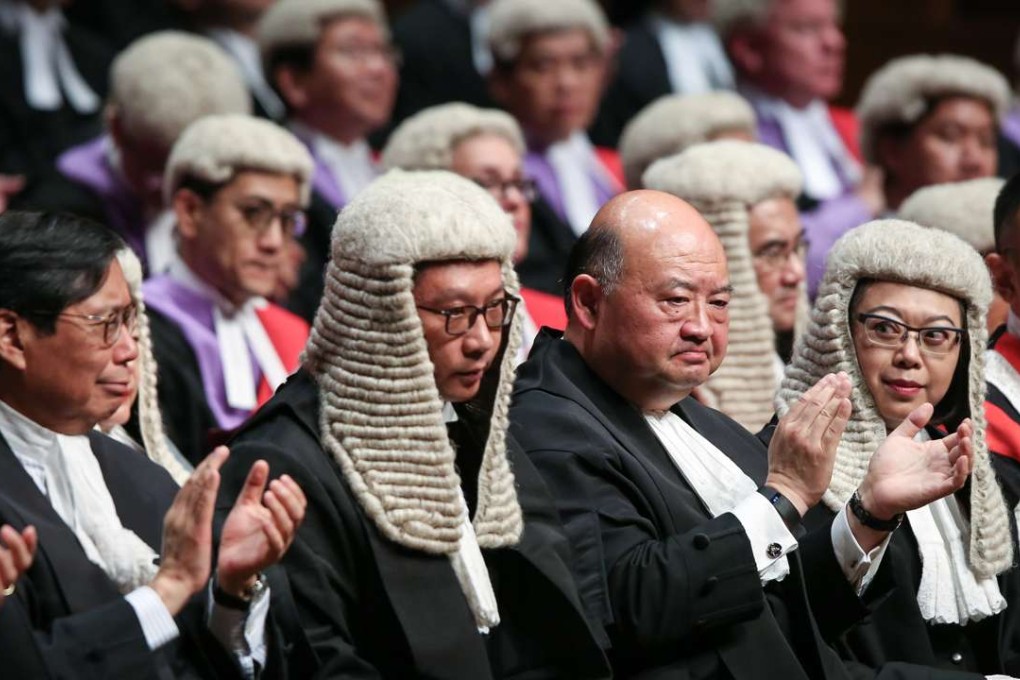 Rimsky Yuen (second left), Geoffrey Ma and Winnie Tam attend the ceremony to mark the opening of the legal year. Photo: Sam Tsang