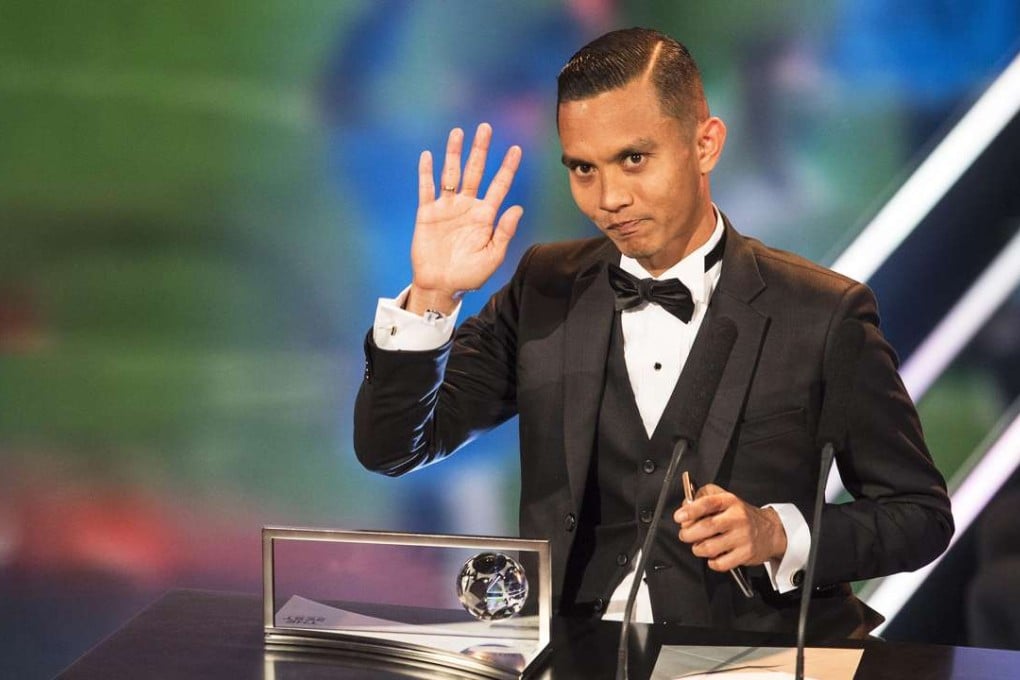 Malaysian soccer player Mohd Faiz Subri celebrates with the trophy after winning the FIFA Puskas Award during the FIFA Awards 2016 gala at the Swiss TV studio in Zurich, Switzerland, 09 January 2017. EPA/ENNIO LEANZA