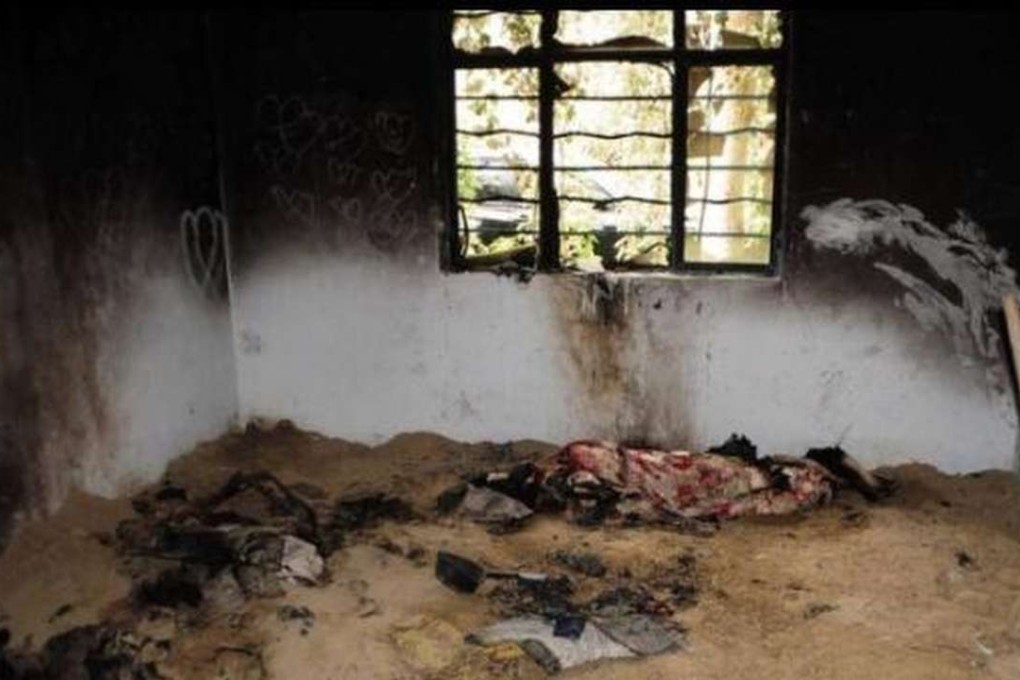 Three suspected terrorists attacked a Communist Party office in Xinjiang on Sunday. Photo: Thepaper.cn