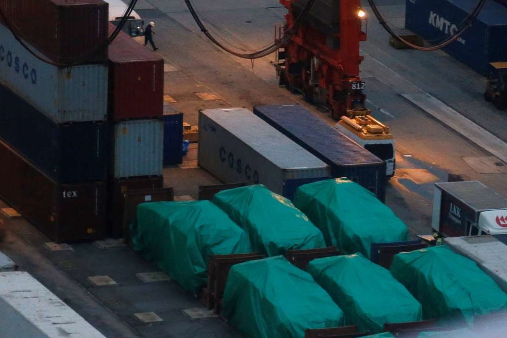 Six of the nine armoured troop carriers belonging to Singapore, from a shipment detained at a container terminal, in Hong Kong. Photo: Reuters