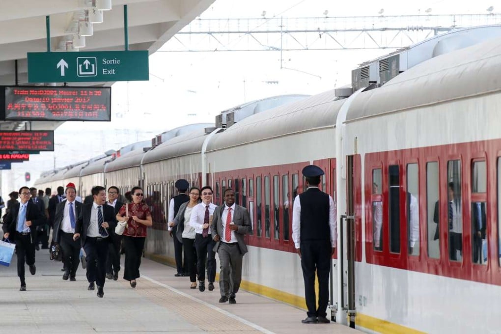 Passengers rush to make the train’s first departure in Djibouti. Photo: Felix Wong
