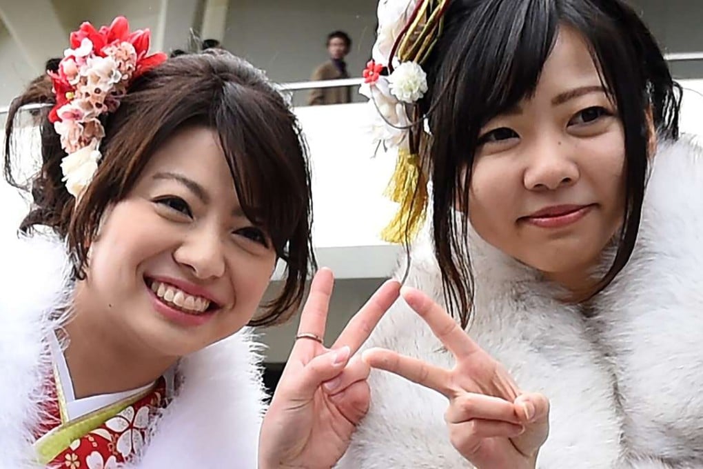 Sign of danger: Flashing ‘peace’ in photos could lead to fingerprint data being stolen. Photo: AFP