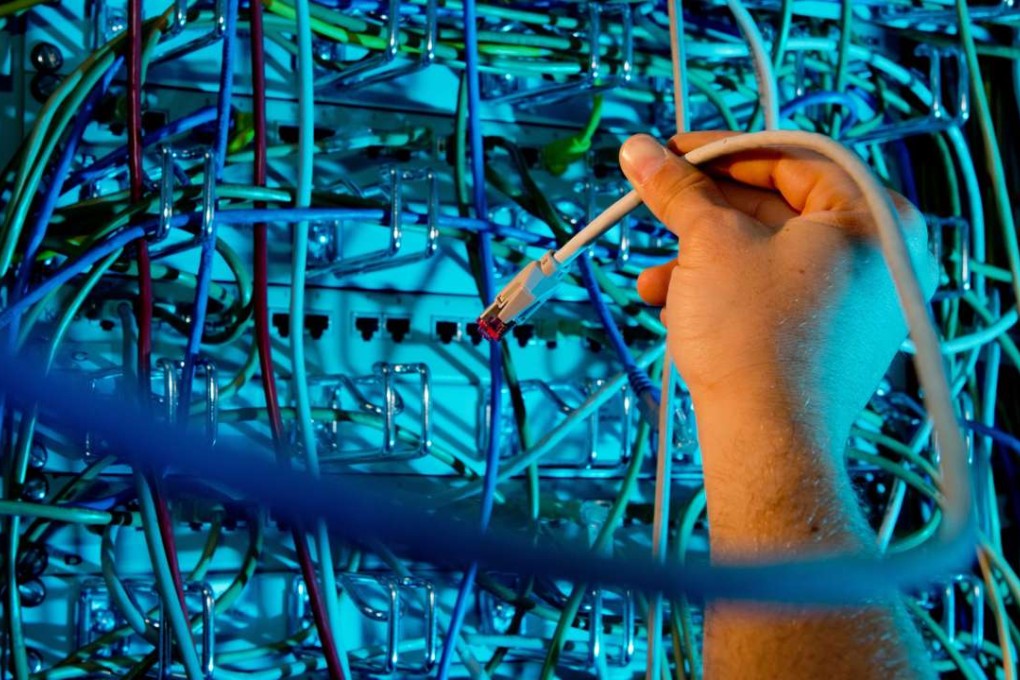Cables inside a server room in Hanover, Germany, one of several countries that are increasing their cybersecurity with more strict data laws. Photo: EPA