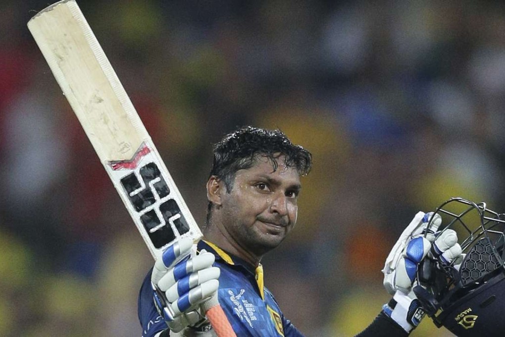 Kumar Sangakkara celebrates a century against Australia at the 2015 World Cup in Hobart. Photo: AP