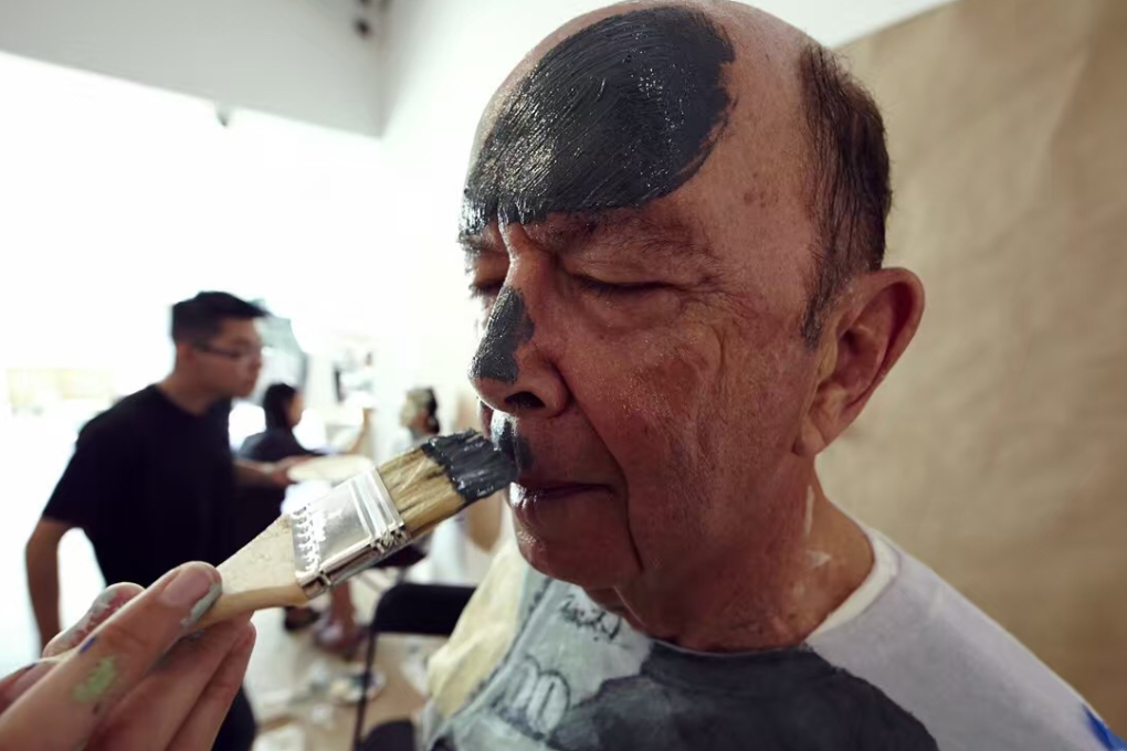 Incoming US commerce secretary Wilbur Ross is painted to appear in Chinese artist Liu Bolin's 'Dollar' in New York in 2014. Photo: Liu Bolin