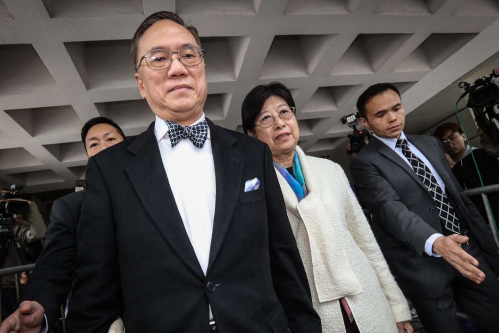 Former chief executive Donald Tsang with his wife Selina Tsang Pou Siu-mei outside the High Court. Photo: Felix Wong