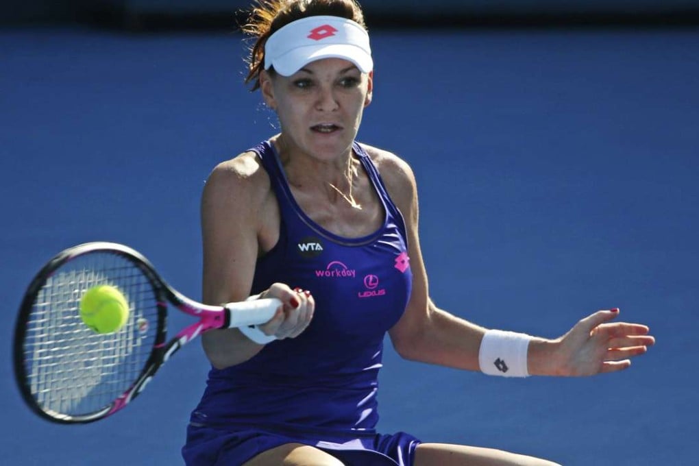 Poland’s Agnieszka Radwanska plays a shot to Barbora Strycova, of Czech Republic. Photo: AP