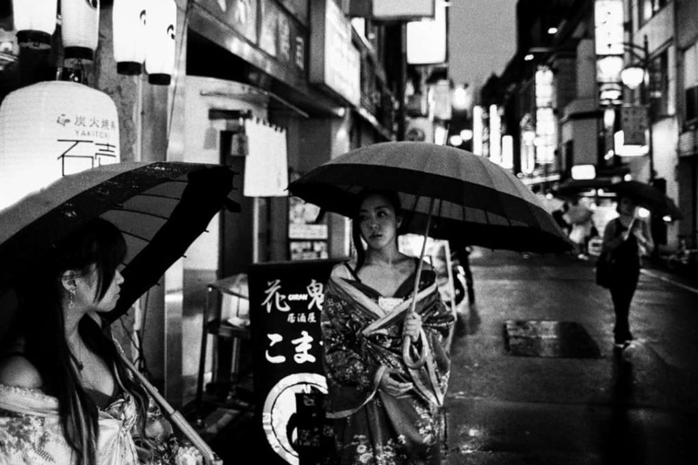 Sheltering in the back streets: an image from the book Tokyo by Paul Bradshaw.