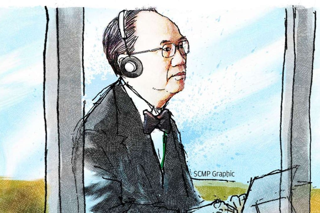 Donald Tsang wore headphones providing Cantonese translation as he sat in the dock.