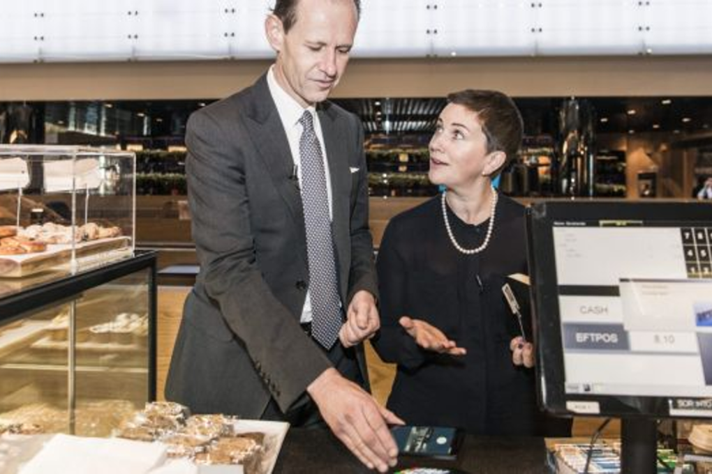 ANZ Bank chief executive Shayne Elliott tries out Android Pay, alongside managing director of products, Katherine Bray. Photo: ANZ