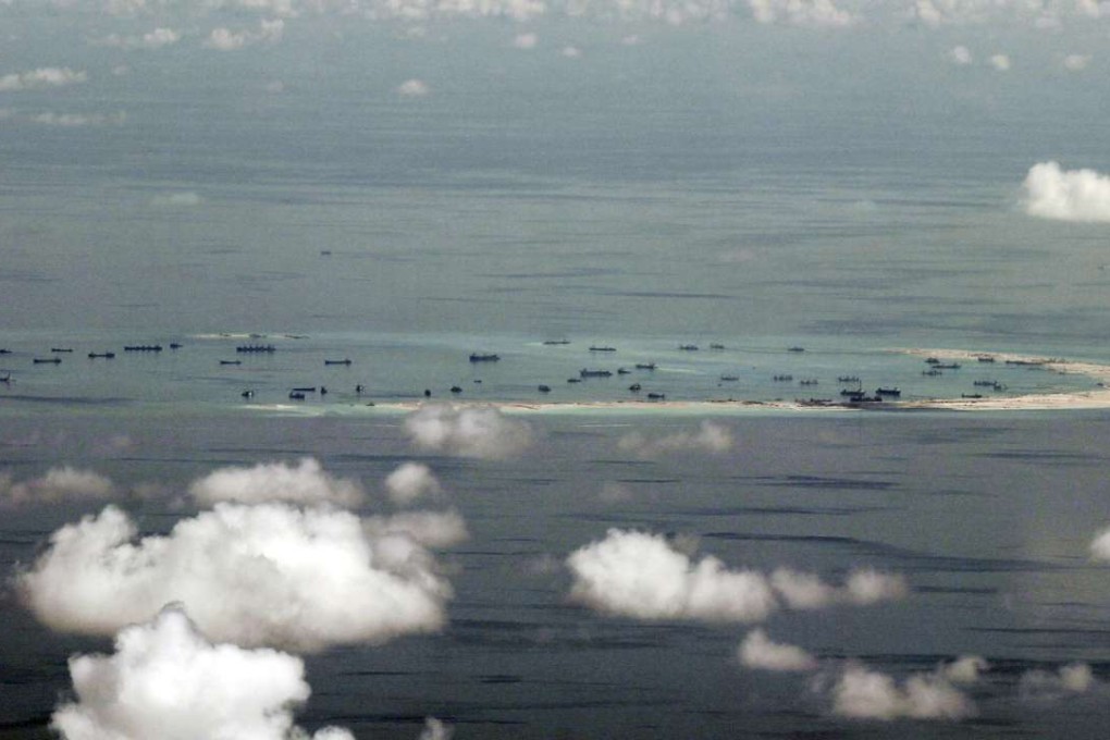 A photo taken from a Philippine military aircraft of reclamation by China on Mischief Reef in the disputed Spratly Islands in the South China Sea, west of Palawan, Philippines, in May, 2015. Photo: Reuters