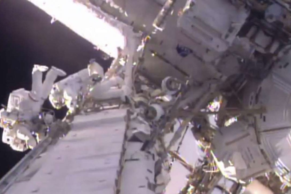 US astronaut Shane Kimbrough (left) and French astronaut Thomas Pesquet during a spacewalk outside the International Space Station. Photo: AP/Nasa