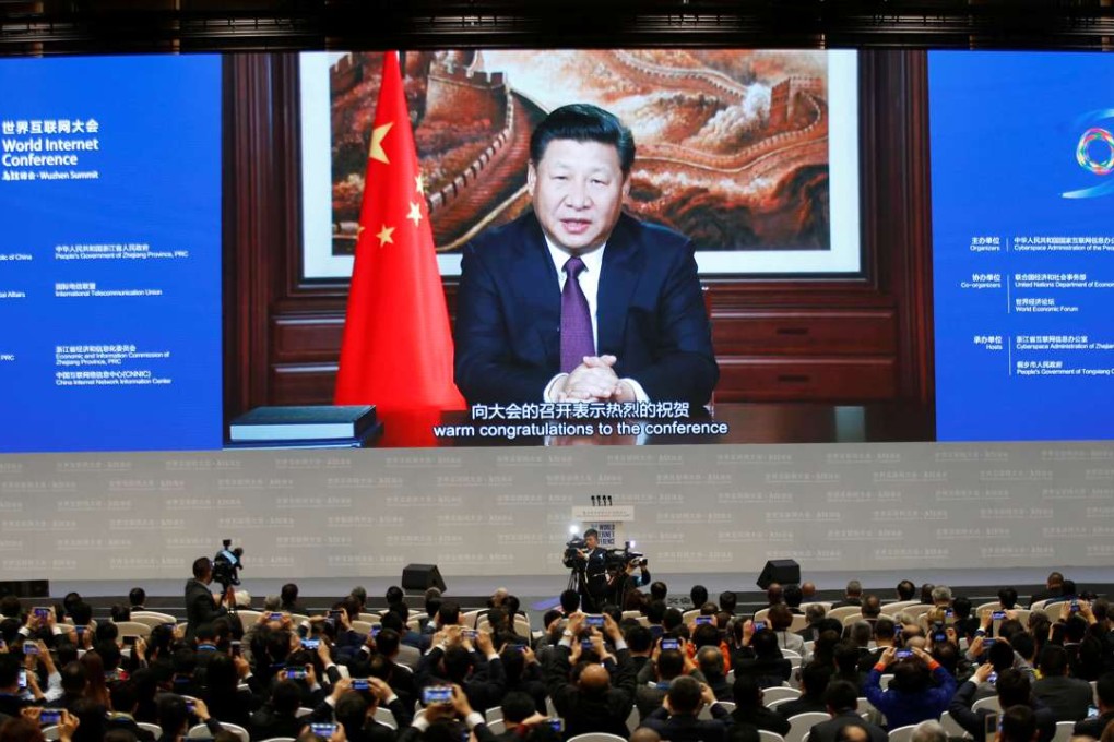 President Xi Jinping addresses the audience via video link during the opening ceremony of the third annual World Internet Conference in Wuzhen, Zhejiang province, last November 16. His presence at Davos is set to mark a consecration for China. Photo: Reuters