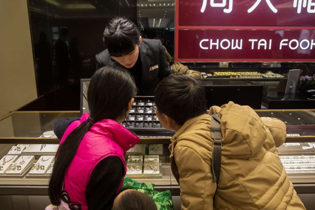 Hong Kong-listed Chow Tai Fook said its same-store sales from October to December compared with the same period last year in mainland China rose four per cent, while in Hong Kong and Macau they slipped two per cent. Photo: Bloomberg