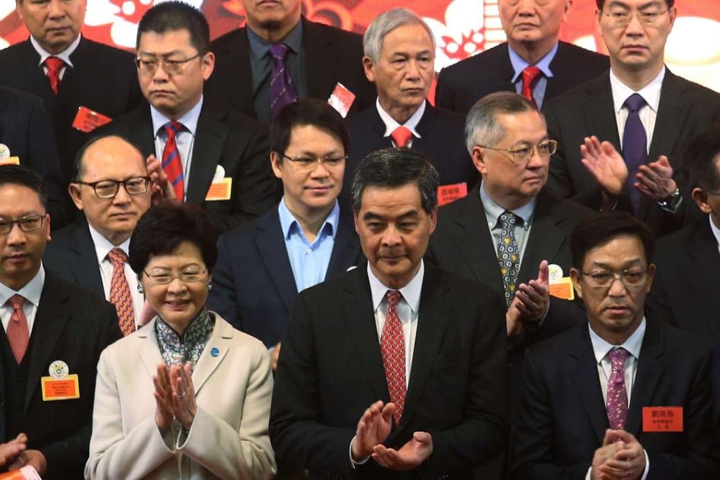 Carrie Lam (front, second left) at a Heung Yee Kuk reception in 2016, with Chief Executive Leung Chun-ying (front, centre) and kuk chairman Kenneth Lau (front, right). Photo: David Wong