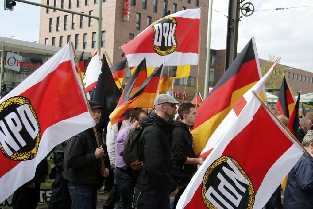 Supporters and members of the far-right National Democratic Party march during a demonstration in Berlin. Photo: Reuters