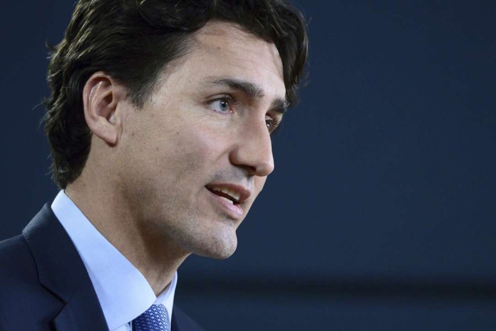 Canada's Prime Minister Justin Trudeau holds a press conference at the National Press Theatre in Ottawa, Ontario. Canada's ethics commissioner is launching an investigation into his recent family holiday at the Aga Khan's private island in the Bahamas. Photo: The Canadian Press via AP