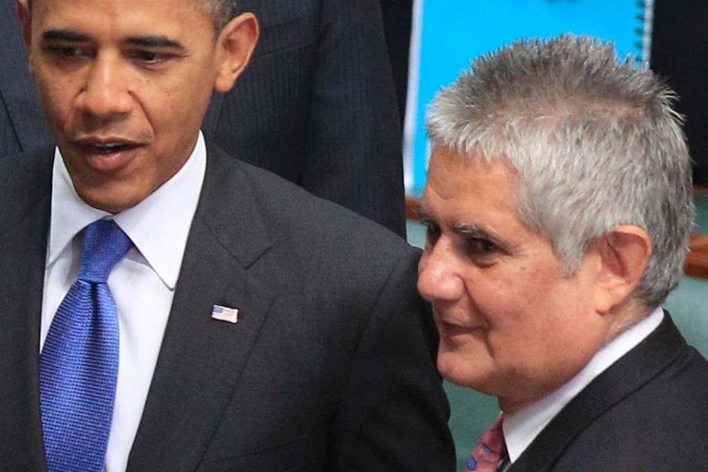 Australian Member of Parliament Ken Wyatt (right) is pictured with visiting US President Barack Obama at Parliament House in Canberra in 2011. On Wednesday, Wyatt was appointed Australia’s first Aboriginal minister. Photo: AFP