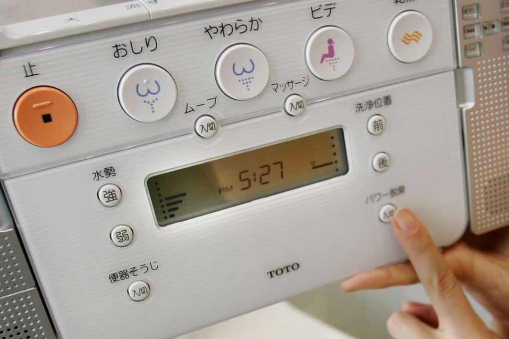 Manufacturers created their own symbols after the first toilet with washing and drying functions appeared in Japan in the mid-1960s. Photo: Reuters