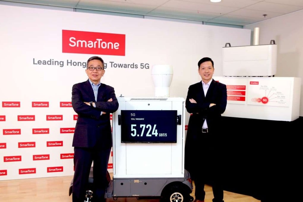 SmarTone chief technology officer Stephen Chau (left) and Ericsson Hong Kong and Macau chief technology officer Michael Lee display the 5G test system. Photo: Handout