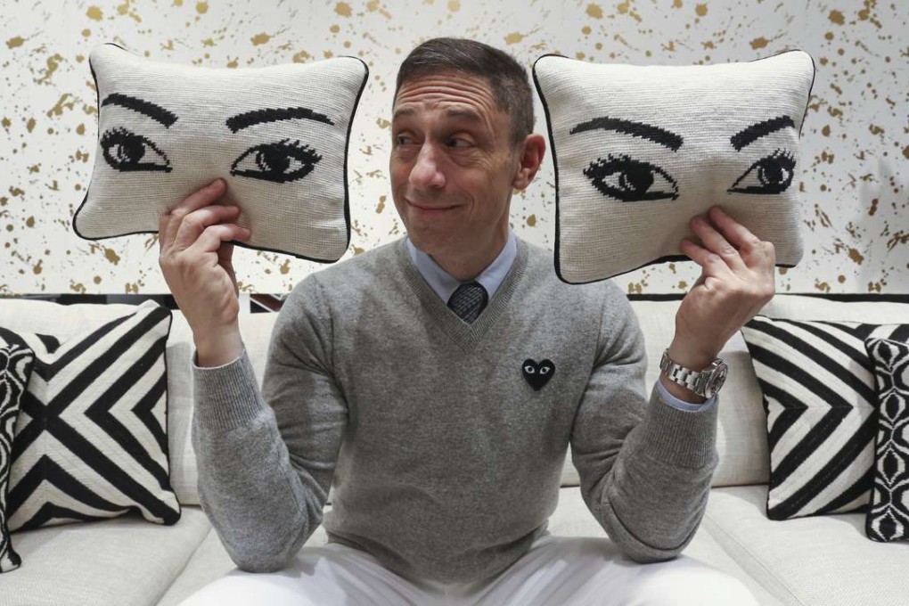 Jonathan Adler with Eye throw pillows. Picture: Jonathan Wong