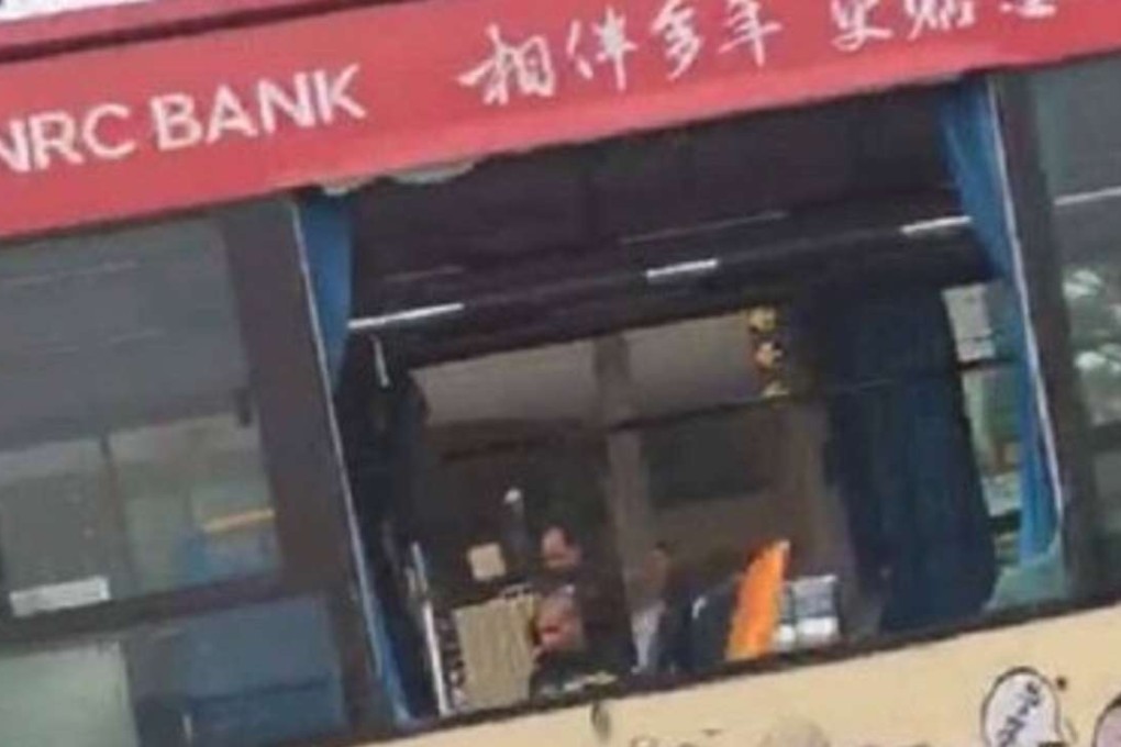 One of the buses in Foshan, after an explosion blew out some of its windows. Photo: Weibo