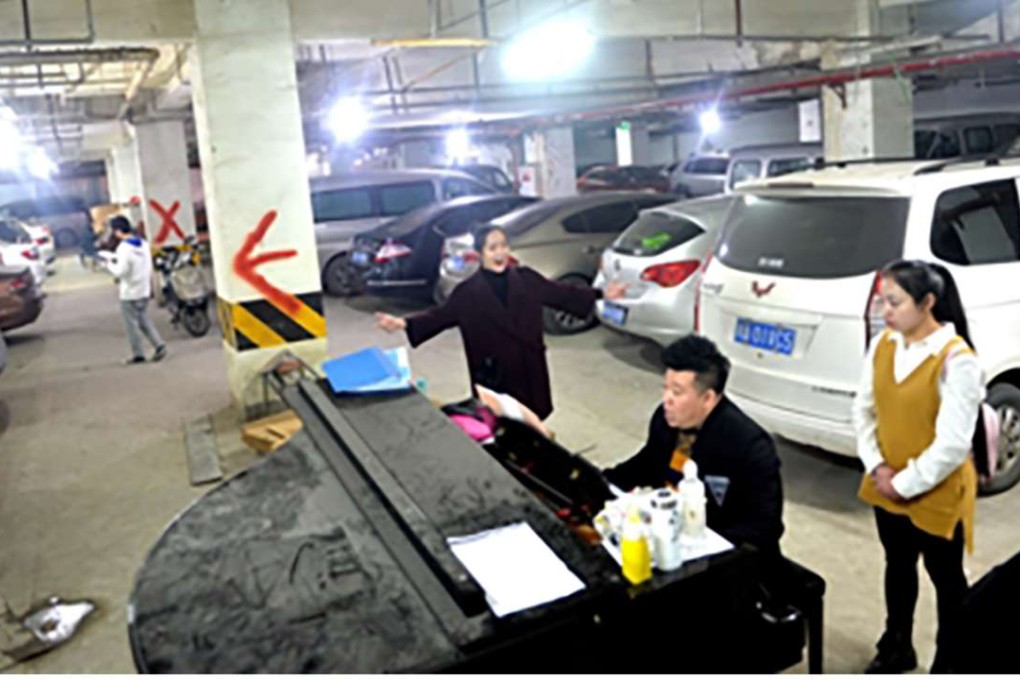 Students practising in the parking lot in Chengdu. Photo: Xinhua
