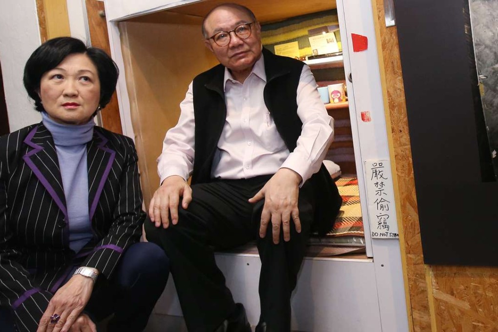 Regina Ip Lau Suk-yee (left) and Woo Kwok-hing at an earlier exhibition organised by the Society for Community Organisation in Sham Shui Po, highlighting the appalling living conditions of some locals. Photo: David Wong