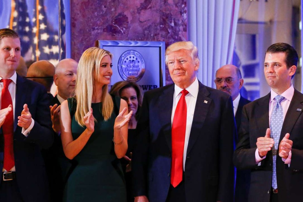 US President-elect Donald Trump is applauded by (from left) son Eric, daughter Ivanka and son-in-law Jared Kushner, ahead of a press conference at the Trump Tower in New York on January 11. Photo: Reuters