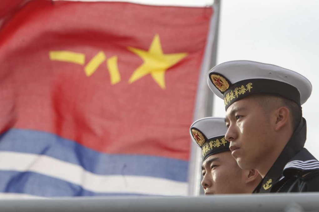 Chinese Navy sailors stand on a Chinese Navy frigate visiting San Diego in December. Photo: AFP