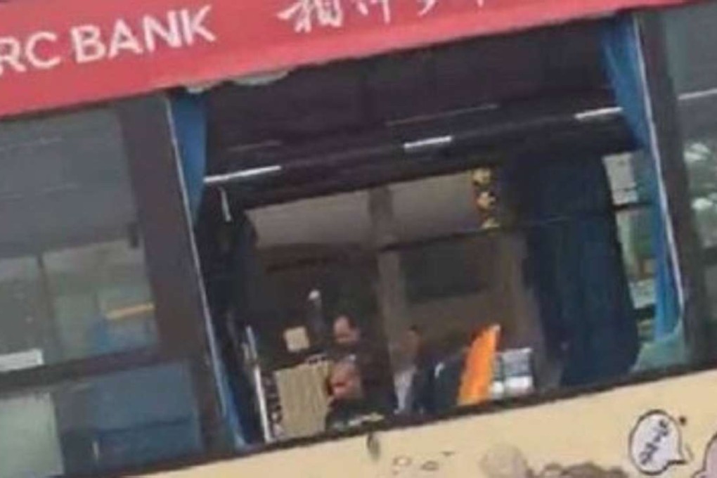 The bus windows were blown out in the first blast in Nanhai, Foshan, Guangdong province, on Wednesday afternoon. Photo: Handout