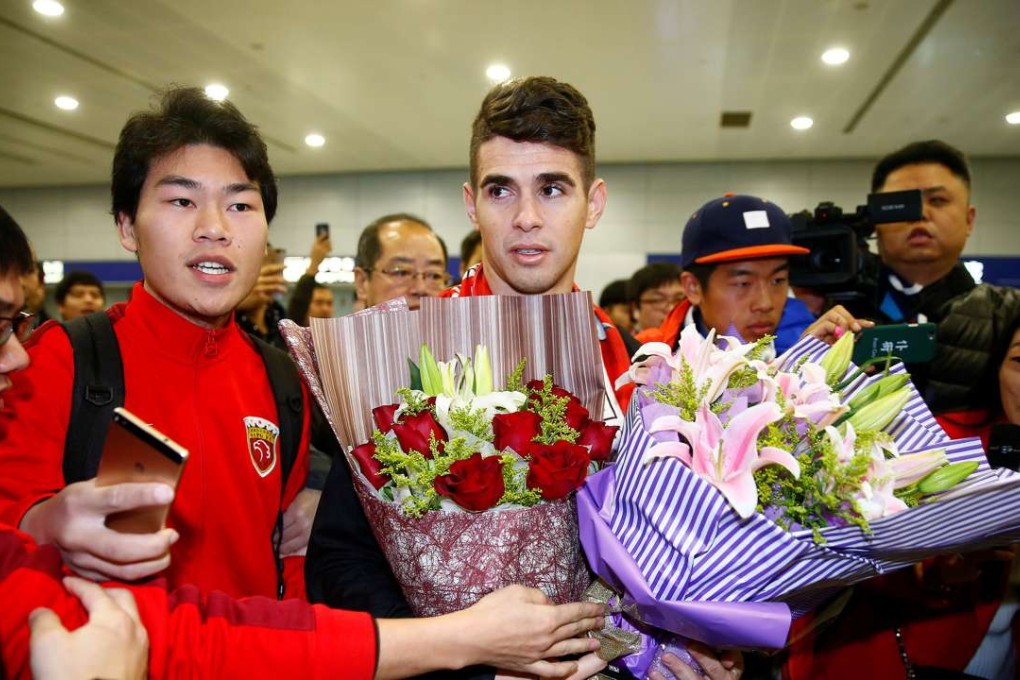 Brazilian international midfielder Oscar arrives in Shanghai after his €60 million transfer from Chelsea. Photo: Reuters