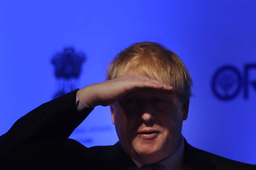 British Foreign Secretary Boris Johnson looks at delegates during a speech in New Delhi, India, on Wednesday. Photo: AP