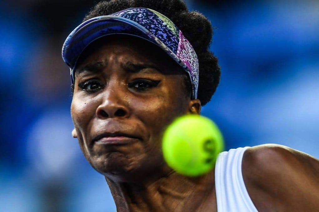 Venus Williams keeps her eye on the ball as she cruises to victory over Duan Yingying in the Australian Open. Photo: EPA
