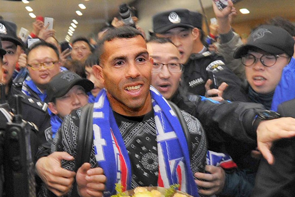 Carlos Tevez arrived in Shanghai on Thursday where he will be payed some HK$5.7 million a week. Photo: Xinhua