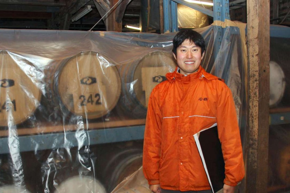 Takahiko Inagaki, a 29-year-old board director of the parent company of Wakatsuru Shuzo. Photo: Kyodo