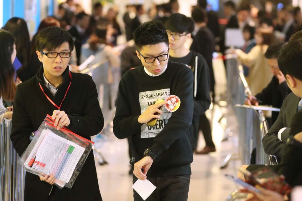 Potential home buyers flocked to the sales office of The Pavilia Bay in Tsuen Wan on Friday morning. Photo: Edward Wong