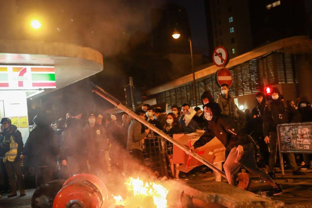 Protesters started fires at 22 locations during 10 hours of rioting last year. Photo: Bloomberg