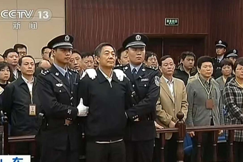 Former Chongqing boss Bo Xilai stands trial for corruption at Shandong High Court in Jinan, Shandong province, on October 25, 2013. During the hearing, he described some of the tactics used by anti-graft interrogators. Photo: CCTV