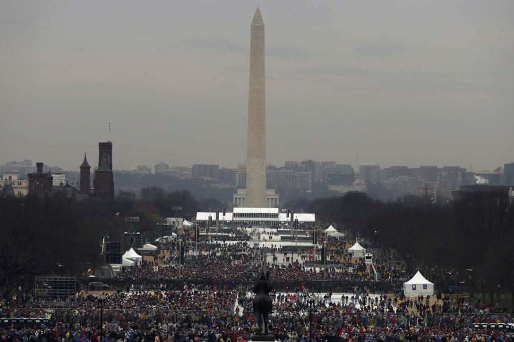 The statue of Civil War General and former US president Ulysses S. Grant faces the Washington Monument and the crowd gathering for the inauguration ceremonies to swear in Donald Trump. Photo: Reuters